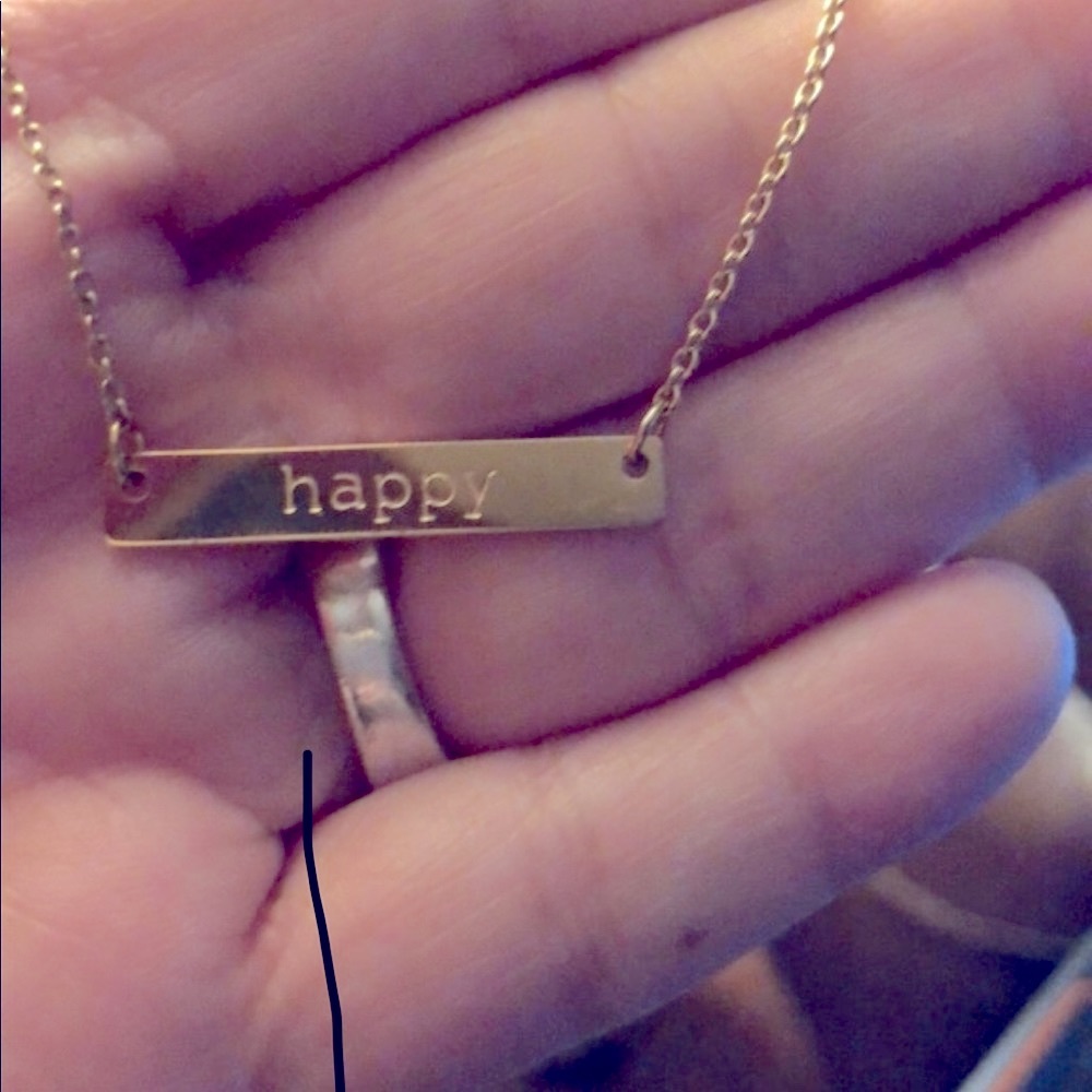 Jook and Nona “Happy” goldtone necklace